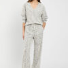 Pantaloni da donna in felpa marca TWINSET colore tweed off white e nero con texture intrecciata e banda laterale su Origami Store