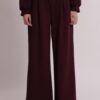 Pantalone di felpa a palazzo da donna colore prugna marchio Mimì Muà Firenze Made in Italy in viscosa con elastico in vita e coulisse su Origami Store