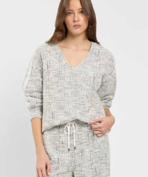 Felpa da donna bicolore off white e nero marchio TWINSET in tweed intrecciato con scollo a V e bande in pizzo e raso su Origami Store